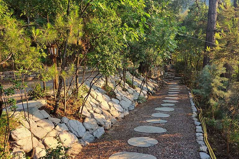 Stone walkway in the garden of Villa Dimitra