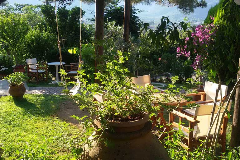 Shaded corners in the garden of Villa Dimitra in Thassos